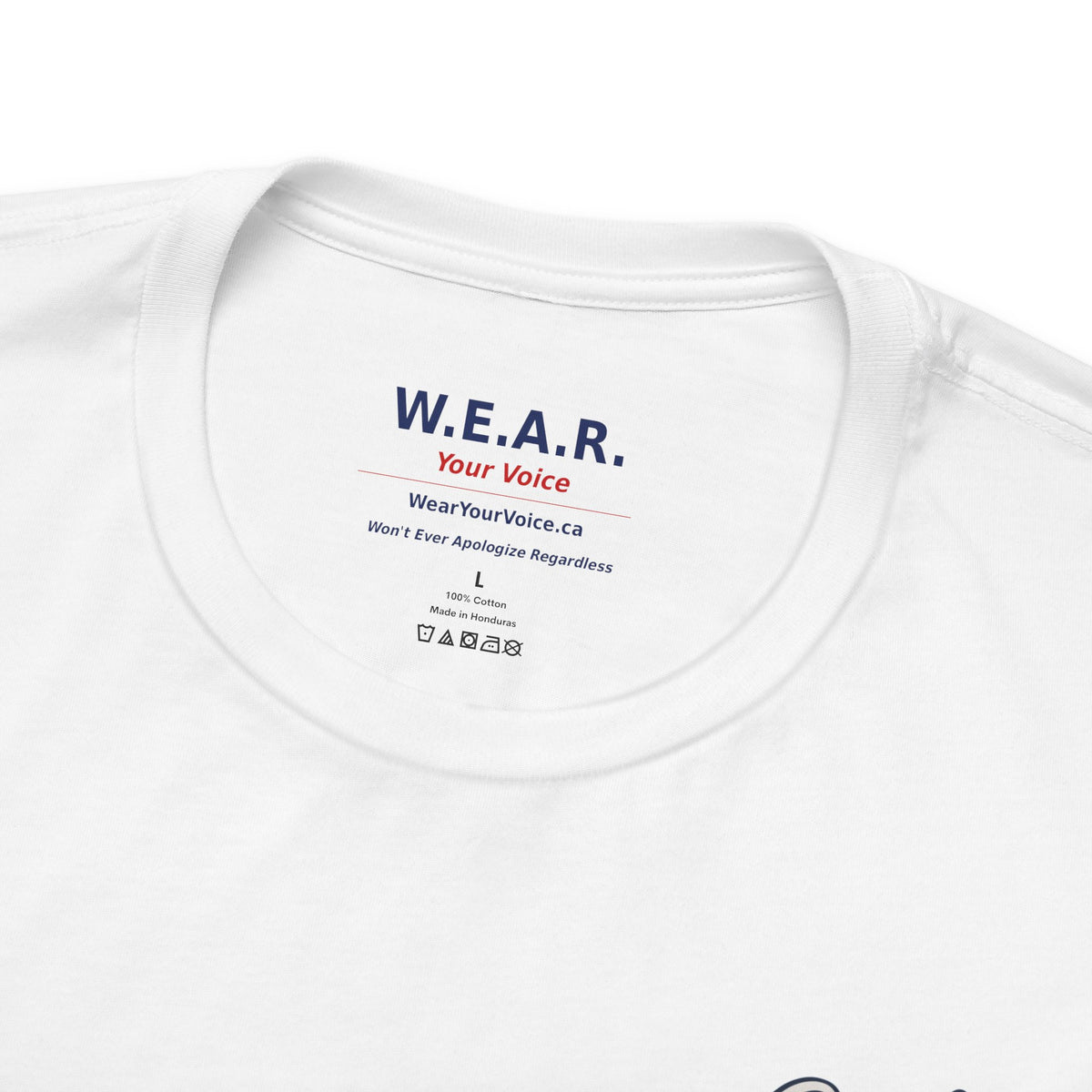 White Clown Show Carney tee — inside collar label — W.E.A.R. Your Voice branding, 100% Cotton Made in Honduras
