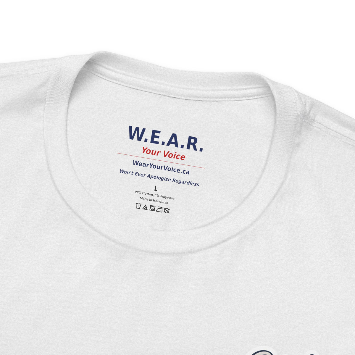 White Clown Show Carney tee — inside collar label — W.E.A.R. Your Voice branding, 99% Cotton 1% Polyester Made in Honduras